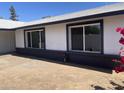 Home backyard area featuring a gravel area and dark grey trim at 4210 W Solano Dr, Phoenix, AZ 85019