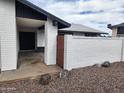 Charming home featuring a gated front entrance and low maintenance landscaping at 4210 W Solano Dr, Phoenix, AZ 85019