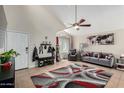 Inviting living room showcasing tile floors, neutral walls, and a cozy seating arrangement at 542 N Orlando Cir, Mesa, AZ 85205