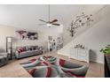 Spacious living room featuring tile floors, soaring ceilings, and ample natural light at 542 N Orlando Cir, Mesa, AZ 85205