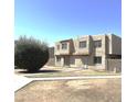 An exterior shot of the building featuring an outdoor space at 600 S Dobson Rd # 148, Mesa, AZ 85202