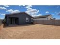 The expansive backyard offers ample space with potential for landscaping or outdoor activities at 18256 W La Senda Dr, Surprise, AZ 85387