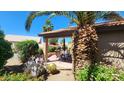 Enjoy the outdoors in this lovely covered patio surrounded by lush desert landscaping at 3928 N 151St Ave, Goodyear, AZ 85395