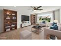 Inviting living room with large window, stylish furniture, and modern decor at 6027 E Spring Rd, Scottsdale, AZ 85254
