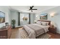 Serene main bedroom with a comfortable bed, soft lighting, and stylish decor at 6027 E Spring Rd, Scottsdale, AZ 85254