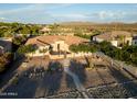 Sprawling property with mature landscaping, desert flora, and an inviting entrance in a beautiful neighborhood at 7969 S 172Nd St, Queen Creek, AZ 85142