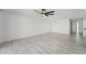 Bright and airy living room features tile flooring, ceiling fan, and modern lighting at 1021 S Greenfield Rd # 1077, Mesa, AZ 85206