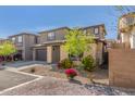 Beautiful two-story home with a two-car garage and vibrant xeriscape landscaping for a modern look at 17736 W Cassia Way, Goodyear, AZ 85338