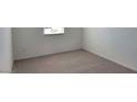 A cozy bedroom with carpet flooring, natural light, and simple design at 18268 W La Senda Dr, Surprise, AZ 85387