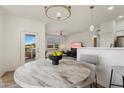 Bright dining space with views to living area and balcony, perfect for entertaining at 20100 N 78Th Pl # 3084, Scottsdale, AZ 85255