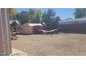 Spacious backyard provides a private outdoor retreat with potential for customization at 8609 E Dewberry Ave, Mesa, AZ 85208