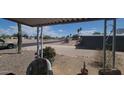 Enjoy the neighborhood from your covered porch area in this home at 8609 E Dewberry Ave, Mesa, AZ 85208