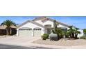 Beautiful single-story house featuring a two-car garage, desert landscaping, and a well-kept front yard at 520 E Appaloosa Rd, Gilbert, AZ 85296