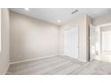 An inviting bedroom features neutral walls, carpet, and a closet with sliding doors at 18840 N 269Th Ave, Buckeye, AZ 85396