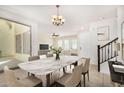 Elegant dining area flows into the living space, ideal for Gathering meals at 3530 S Bandit Rd, Gilbert, AZ 85297