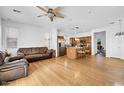 Bright and airy living room featuring hardwood floors, neutral walls, and ample space for seating at 3745 E Flamingo Way, Gilbert, AZ 85297