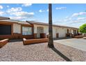 Charming single-story home featuring a two-car garage and low-maintenance desert landscaping for a clean, inviting curb appeal at 8020 E Keats Ave # 285, Mesa, AZ 85209