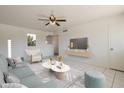 Bright living room featuring modern furniture and decor, creating a comfortable and stylish space at 946 S Pomeroy Cir, Mesa, AZ 85210
