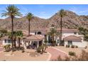 Beautiful home with desert landscaping, grand entrance, and mountain views at 11809 S Montezuma Ct, Phoenix, AZ 85044