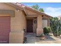 Close-up of front entrance with security door and desert landscaping at 2467 E Winchester Pl, Chandler, AZ 85286