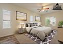 Serene bedroom featuring a cozy bed, soft lighting, and coordinated decor for a relaxing retreat at 25860 N 47Th Pl, Phoenix, AZ 85050