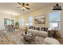 Bright living room featuring stylish furniture, neutral color palette, and modern decor for a welcoming ambiance at 25860 N 47Th Pl, Phoenix, AZ 85050