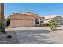Single-Gathering home featuring neutral stucco, a two-car garage, and desert landscaping at 3898 E San Remo Ave, Gilbert, AZ 85234