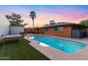 Private backyard featuring a refreshing swimming pool, perfect for relaxation and outdoor enjoyment at 3919 S Siesta Ln, Tempe, AZ 85282