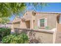 Close up of the exterior featuring lush landscaping, and charming window seating at 4084 E Caitlin Dr, San Tan Valley, AZ 85140