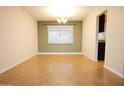 Inviting dining room with tiled floors and large window at 4841 W Mercer Ln, Glendale, AZ 85304
