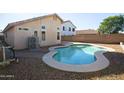 Private backyard featuring a refreshing pool, perfect for relaxation and outdoor enjoyment at 12205 N 41St Ln, Phoenix, AZ 85029