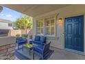 Cozy covered patio featuring comfortable seating, perfect for outdoor relaxation and entertaining at 2545 E Harrison Ct, Gilbert, AZ 85295