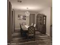Elegant dining room features stylish table and chairs, decorative hutch, and modern light fixture at 7616 W Jones Ave, Phoenix, AZ 85043