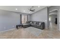 Comfortable living room featuring a large sectional sofa and neutral decor at 8524 S 49Th Ln, Laveen, AZ 85339