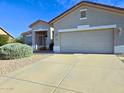Well-maintained home featuring a low-maintenance yard, a two-car garage, and neutral tones at 1210 E Westchester Dr, Chandler, AZ 85249