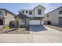 Charming two-story home featuring a two car garage, neutral color palette and low maintenance landscaping at 630 W Laredo St, Chandler, AZ 85225