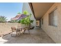 Outdoor patio with table and chairs, perfect for enjoying the outdoors at 7625 E Camelback Rd # B124, Scottsdale, AZ 85251