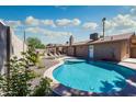 Refreshing backyard pool surrounded by lush landscaping, providing a tranquil and private retreat at 8338 E Monterosa St, Scottsdale, AZ 85251