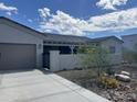 Beautiful home featuring neutral colors, a well-manicured yard, and a covered porch for outdoor relaxation at 34047 N 10Th St, Phoenix, AZ 85085