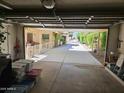 View from inside garage to the covered driveway that leads to the street at 5120 E Janice Way, Scottsdale, AZ 85254