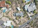An aerial view of the property showcasing its lush desert landscaping and prime location at 5412 E Rockridge Rd, Phoenix, AZ 85018