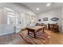 A game room area featuring a pool table and bar with seating at 6003 N 132Nd Dr, Litchfield Park, AZ 85340