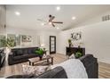 Comfortable living area featuring stylish furnishings, a ceiling fan, and lots of natural light at 6217 W Comet Ave, Glendale, AZ 85302
