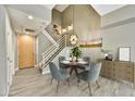 Inviting dining area featuring modern lighting and stylish decor, perfect for intimate gatherings at 16 W Encanto Blvd # 22, Phoenix, AZ 85003