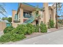 Charming two-story condo with lovely desert landscaping and a secure stairwell entry at 225 W 1St St # 134, Mesa, AZ 85201