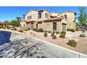 Charming home with a desert landscape, neutral stucco, and stone accents on a sunny day at 4777 S Fulton Ranch Blvd # 1024, Chandler, AZ 85248