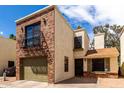 This charming townhouse features mixed exteriors, a private garage, and plenty of natural light at 820 W University Dr # 4, Tempe, AZ 85281