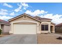 Attractive single-Gathering home featuring a low-maintenance yard and an attached two-car garage at 900 E Saratoga St, Gilbert, AZ 85296