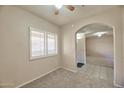 This bedroom features a window with plantation shutters for controlling light and privacy at 920 E Devonshire Ave # 4021, Phoenix, AZ 85014