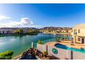Home with a private pool overlooking the community lake, perfect for enjoying outdoor recreation at 16226 S 11Th Pl, Phoenix, AZ 85048